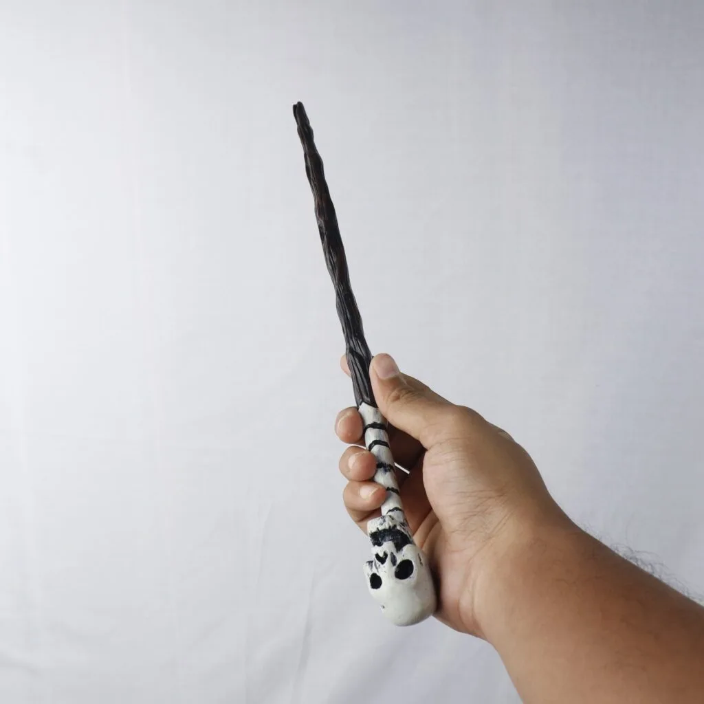 Death Eater Skull Wand in hand